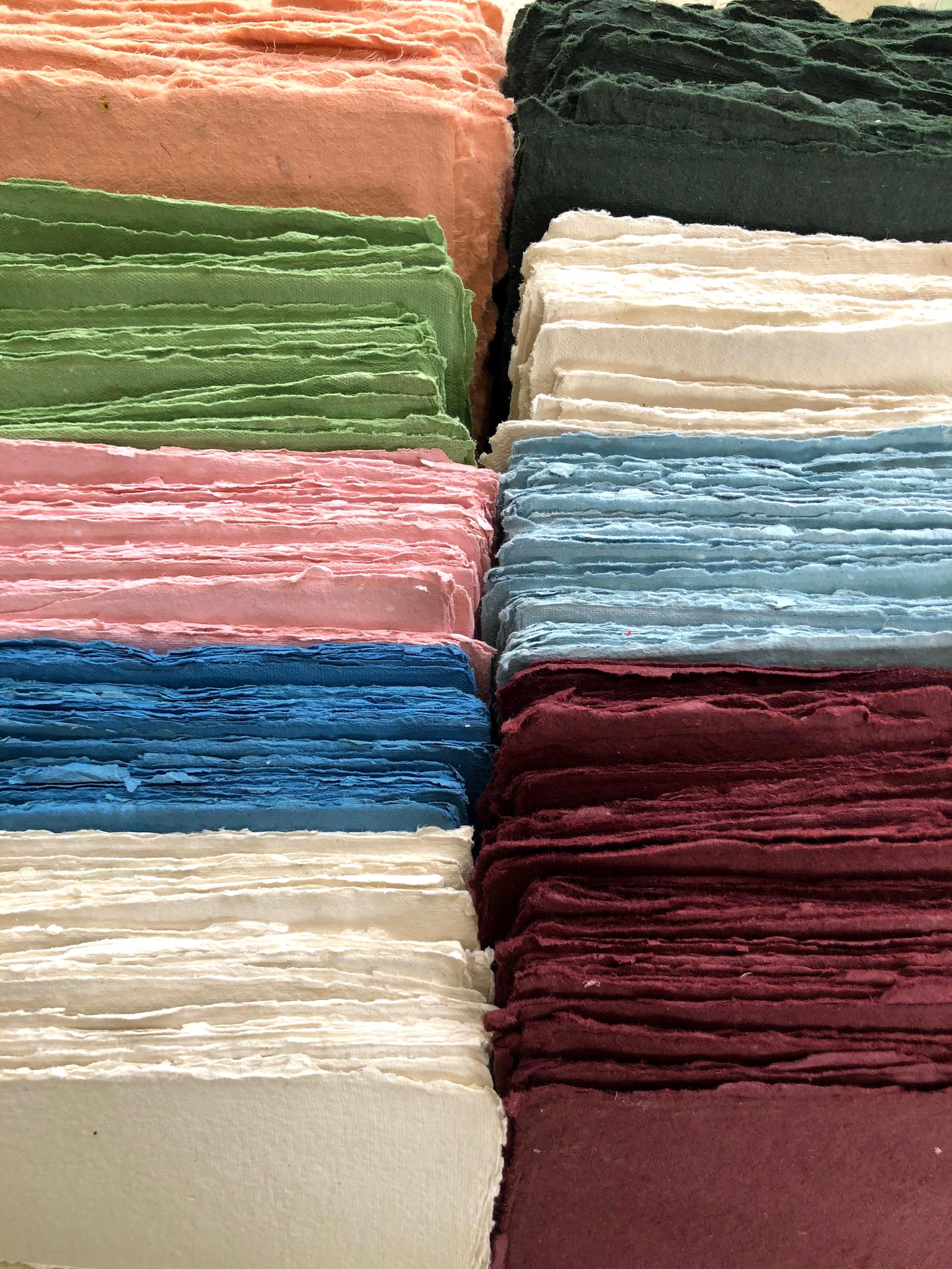 Colourful handmade deckled edge papers